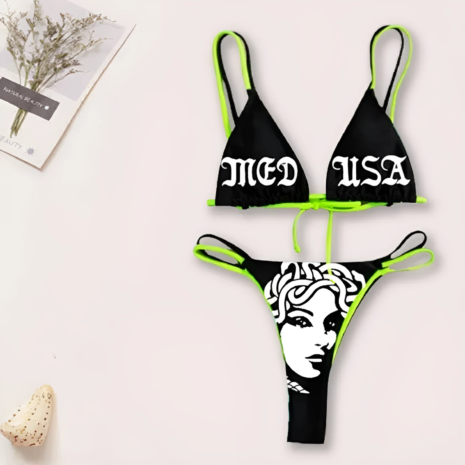 Women's black curve skull tube top bikini set with matching shorts, polyester fabric