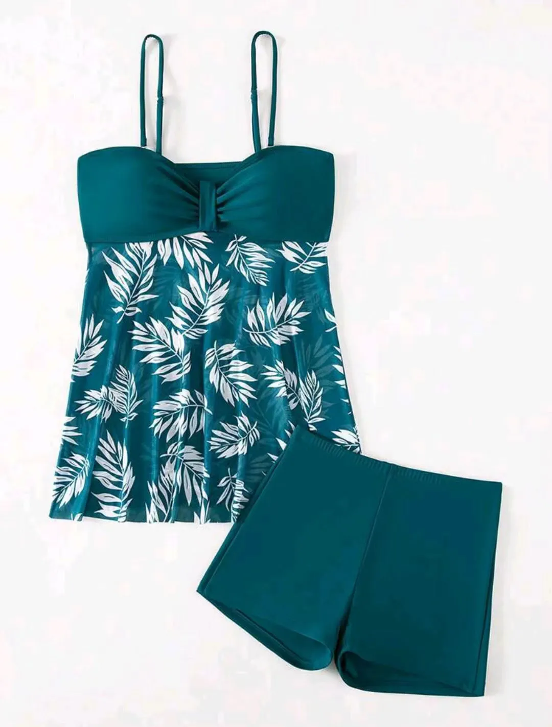 Women's high waist swim boxers in blue with mesh side panels on a mannequin.