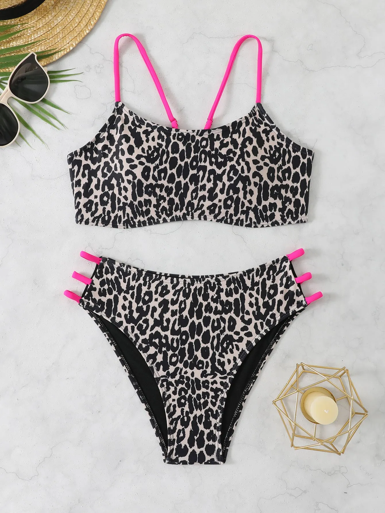 Two-piece leopard print bikini swimsuit with multi-rope detail, polyester, sizes S to XL, in blue and pink leopard colourways