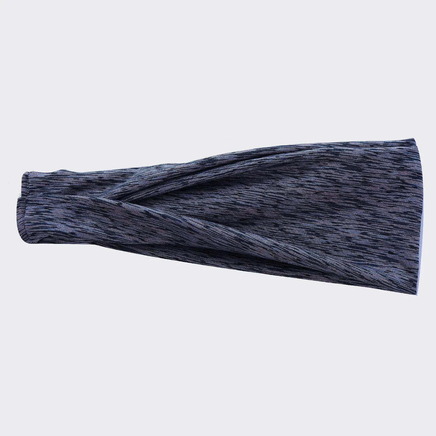 Placed flat, a plaid pattern sports headband in a neutral colour, with geometric elements at the centre