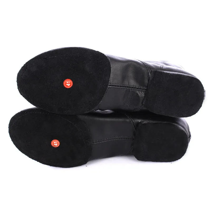 Genuine leather ballet shoes with cowhide suede sole in pigskin outsole colour on a dance studio floor