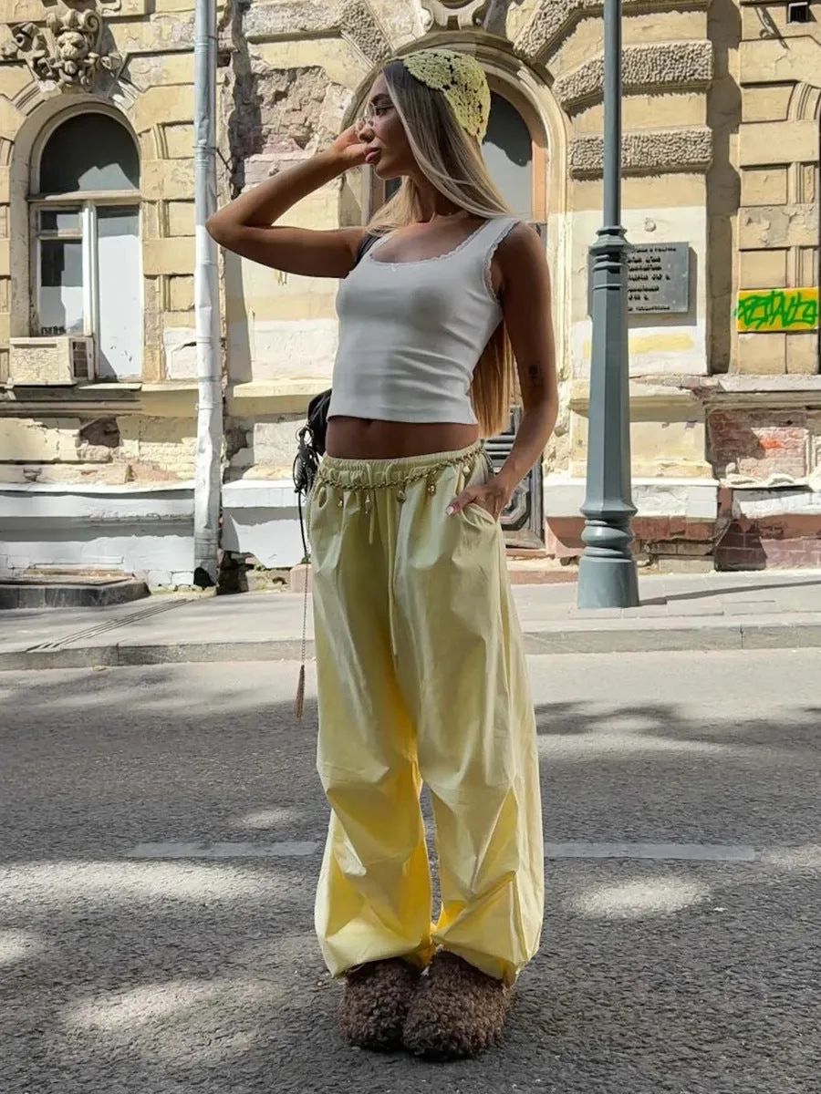 Women's loose casual cotton drawstring trousers in solid yellow colour, straight leg mid waist cut, available in sizes S M L