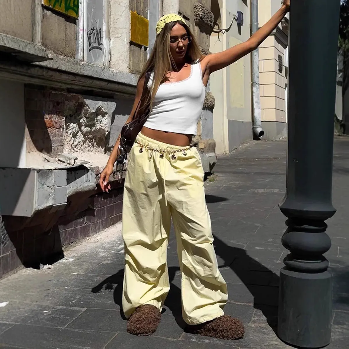 Women's loose casual cotton drawstring trousers in solid yellow colour, straight leg mid waist cut, available in sizes S M L