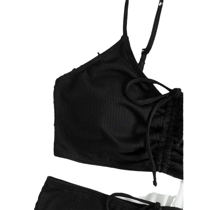Black women's high waist bikini swimsuit with sling split design showing front view