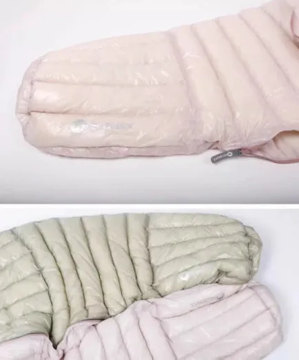 Ultra-light nylon down-filled envelope sleeping bag for camping with duck down insulation in outdoor setting