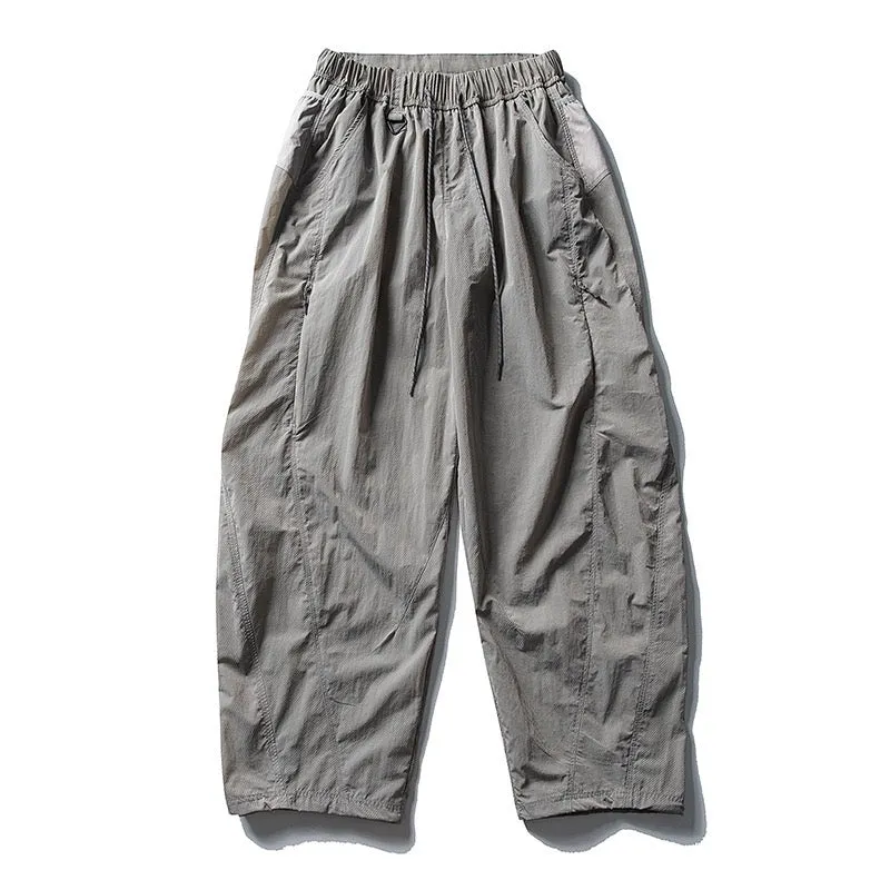 Fleece-lined quick-dry paratrooper cargo pants in army green with cargo pockets and adjustable cuffs