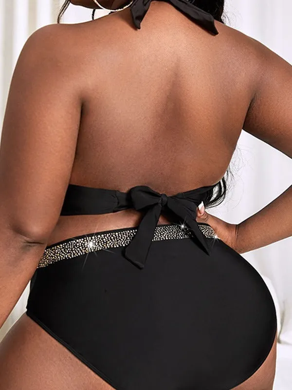 Plus size black women's two-piece bikini swimsuit on a hanger