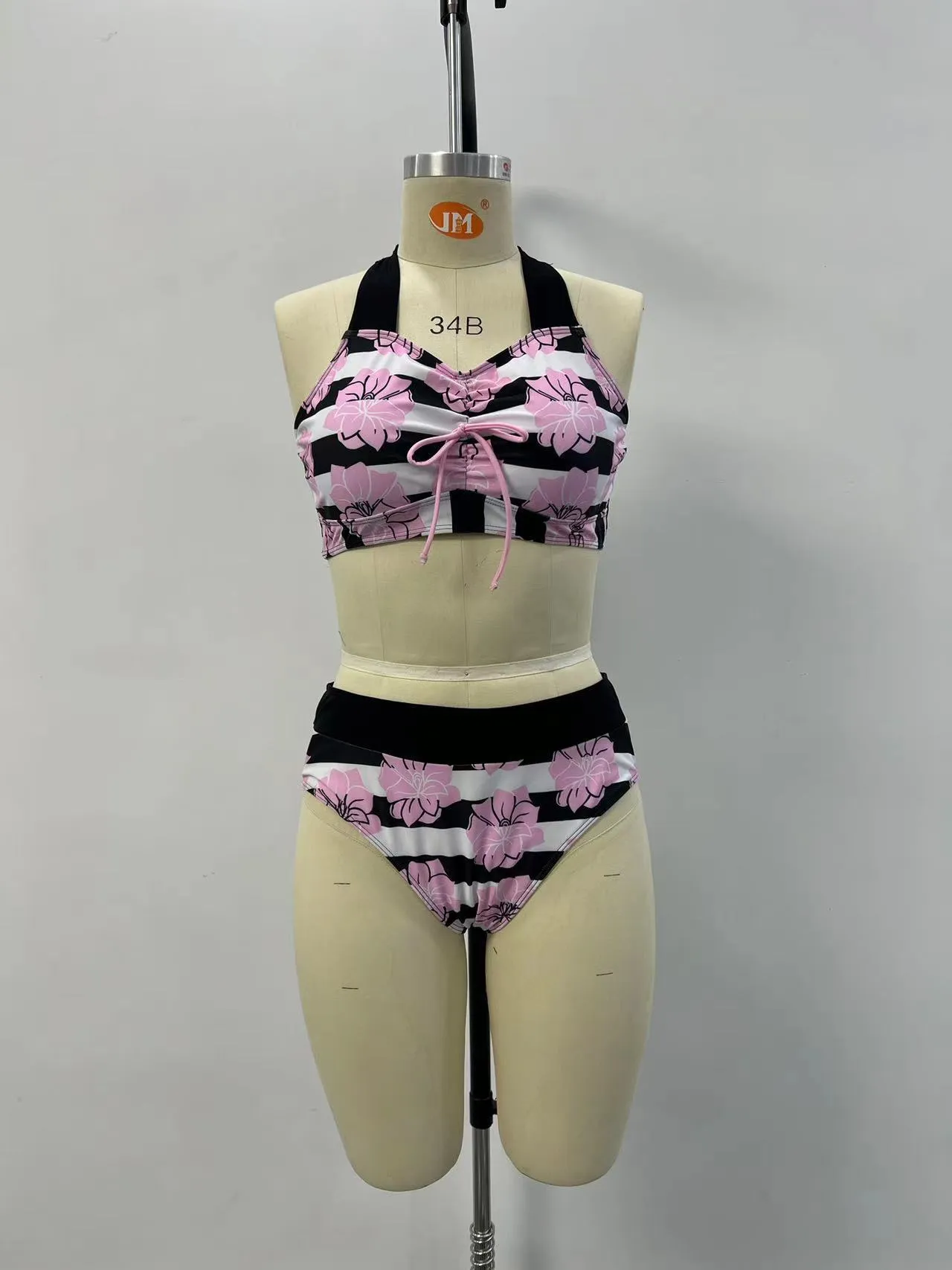 Black women's split bikini with printed belly coverage design for swimming