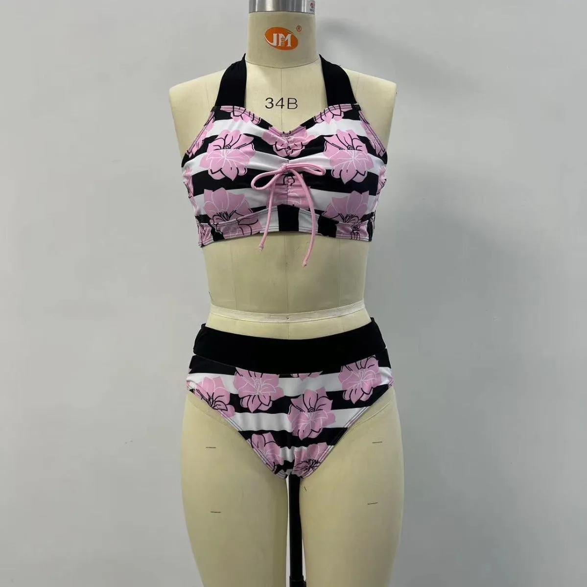Black women's split bikini with printed belly coverage design for swimming