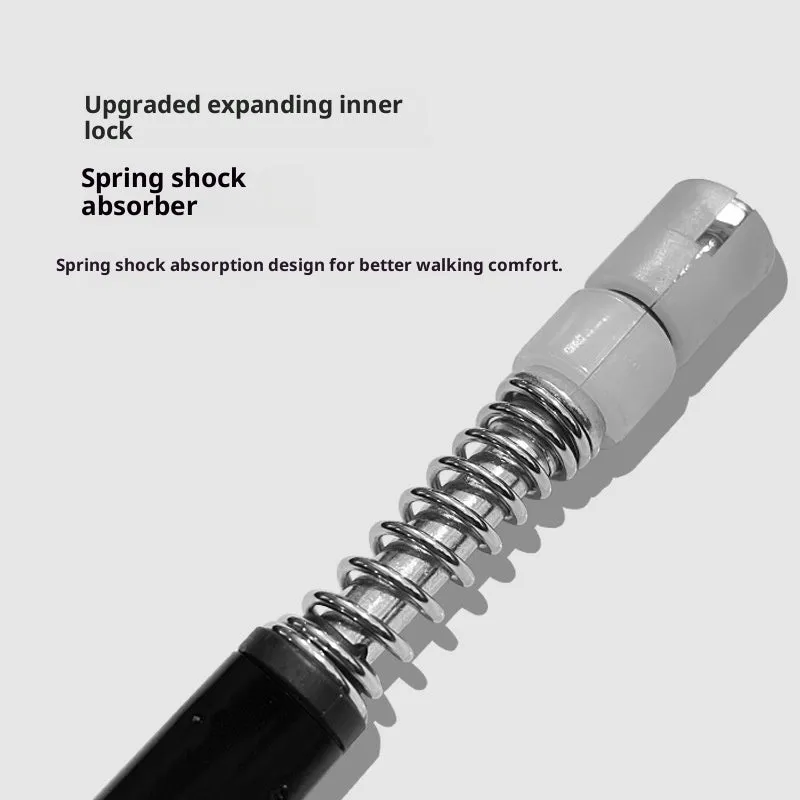 Silver four-section aluminium alloy alpenstock with curved handle, extended to full height on outdoor trail