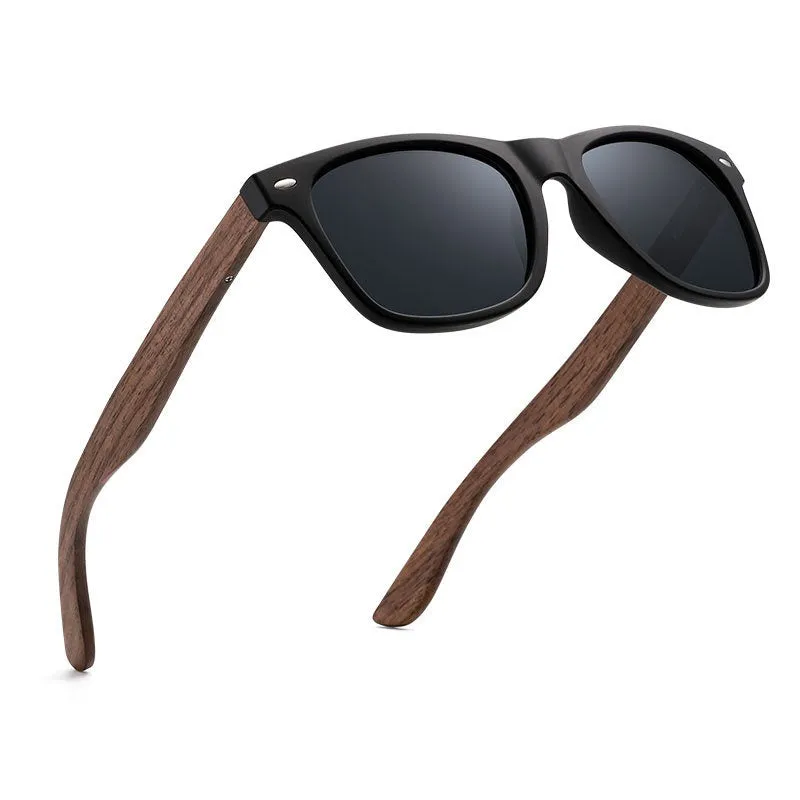 Polarised sunglasses with bamboo and wood arms, gray lens, PC frame on white background