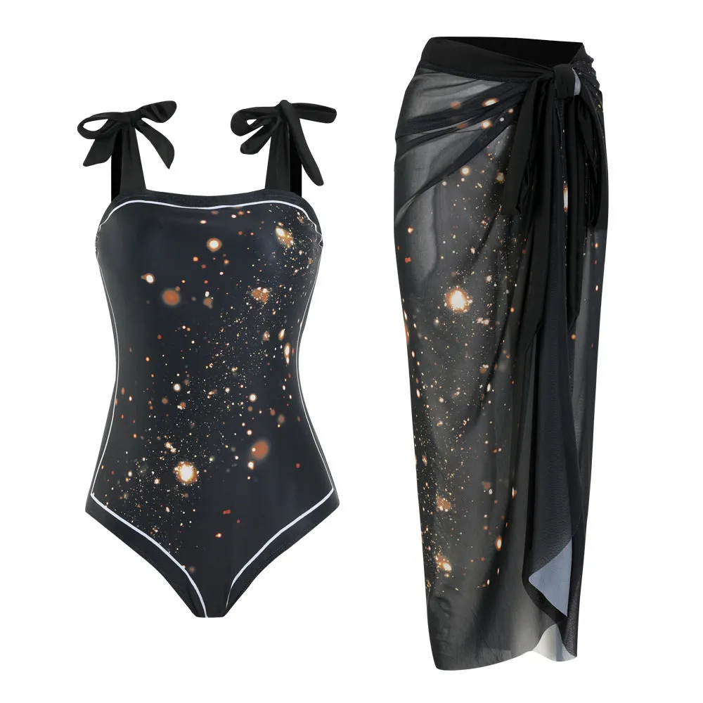 Floral print conservative one-piece swimsuit with mesh tube top and matching skirt.