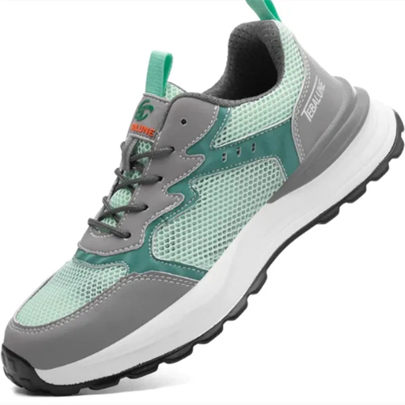 Green low-top safety work shoes with a mesh upper, plastic steel toecap, and a slip-on design.