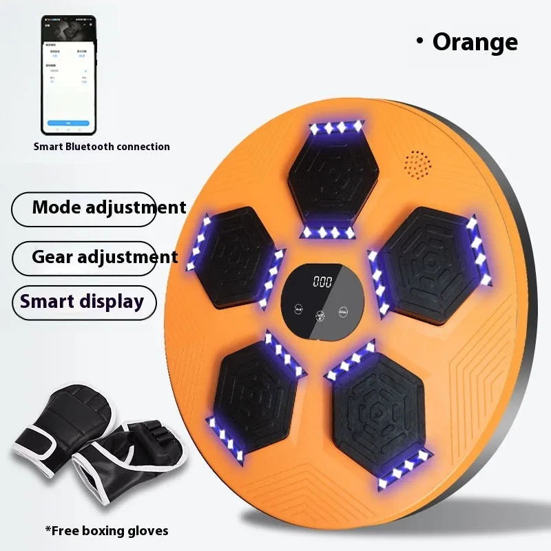 Smart music boxing machine reaction target hanging on wall with matching training gloves