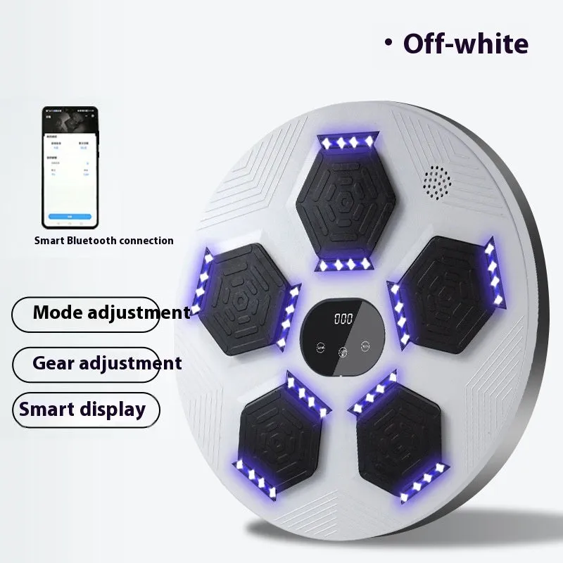 Smart music boxing machine reaction target hanging on wall with matching training gloves