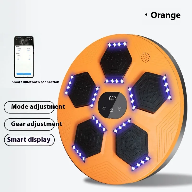 Smart music boxing machine reaction target hanging on wall with matching training gloves