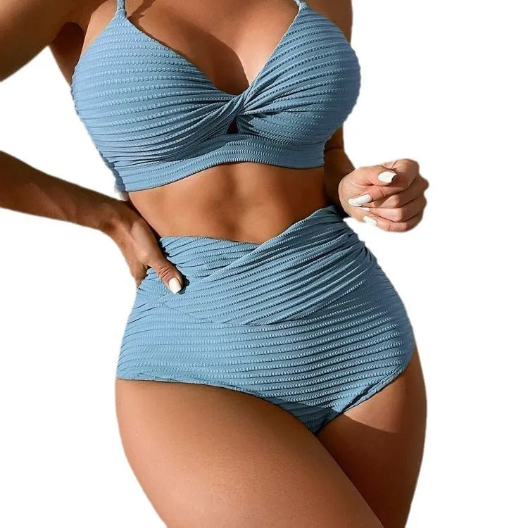 Solid colour blue women's two-piece polyester bikini set on a white background.
