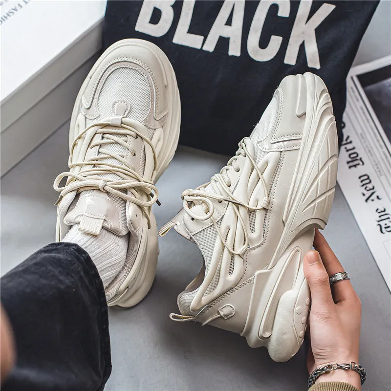 Men's low-top sneakers in beige with mesh and PU leather upper and rubber sole on a plain background