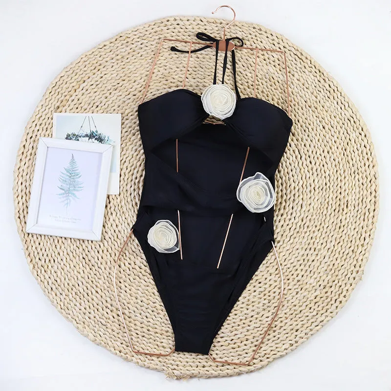 Women's one-piece swimsuit with 3D flower design in black nylon fabric