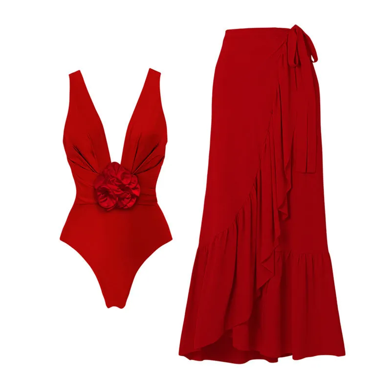 Red women's halter neck one-piece swimsuit with detachable long skirt, showing V-neck and open back design.
