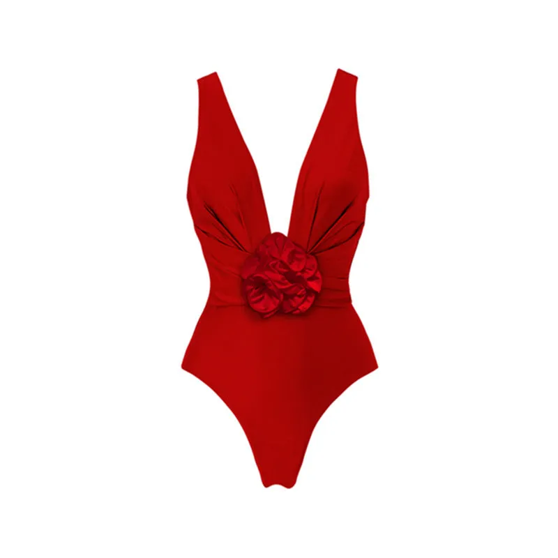 Red women's halter neck one-piece swimsuit with detachable long skirt, showing V-neck and open back design.