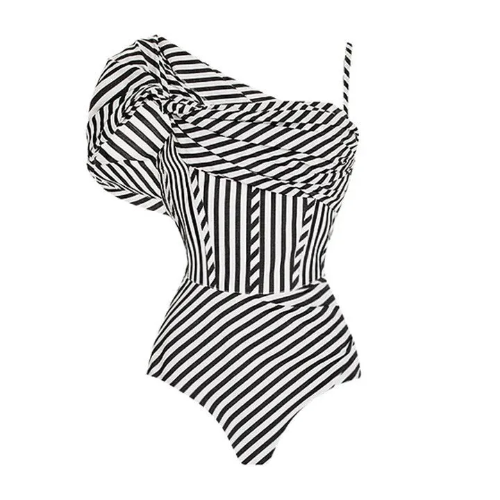 Women's striped one-piece swimsuit with black ruffled skirt detail for swimming and beachwear