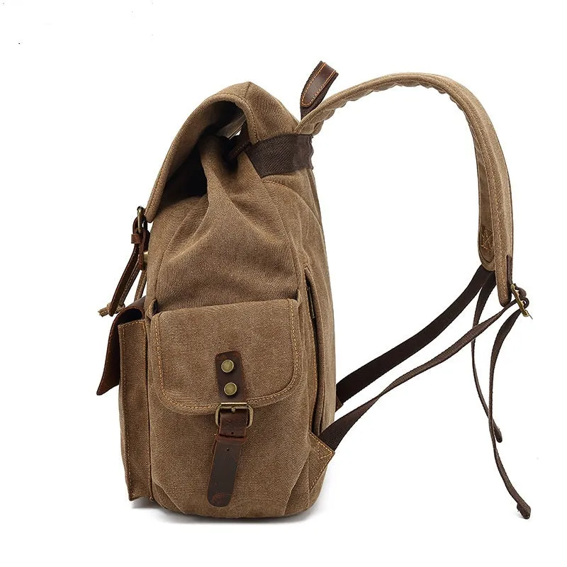 Retro canvas backpack in army green with antique bronze hardware showing dimensions and laptop compartment