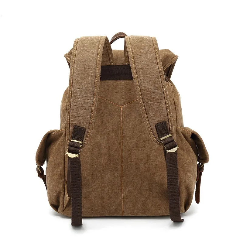 Retro canvas backpack in army green with antique bronze hardware showing dimensions and laptop compartment
