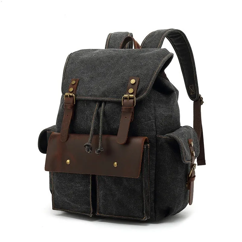 Retro canvas backpack in army green with antique bronze hardware showing dimensions and laptop compartment