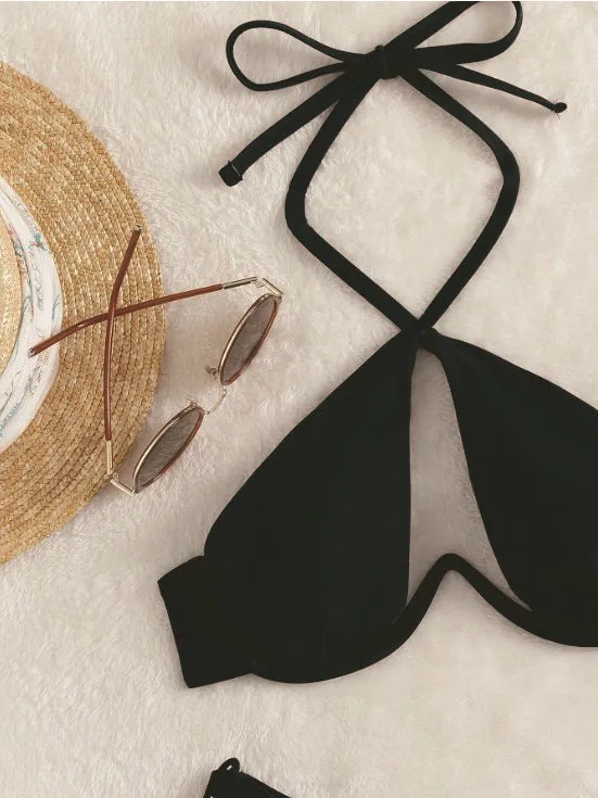 Brown women's halter neck bikini top and briefs-style bottom laid flat.