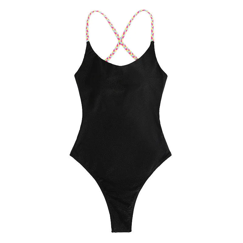 Black solid colour one-piece swimsuit with backless and sleeveless design.