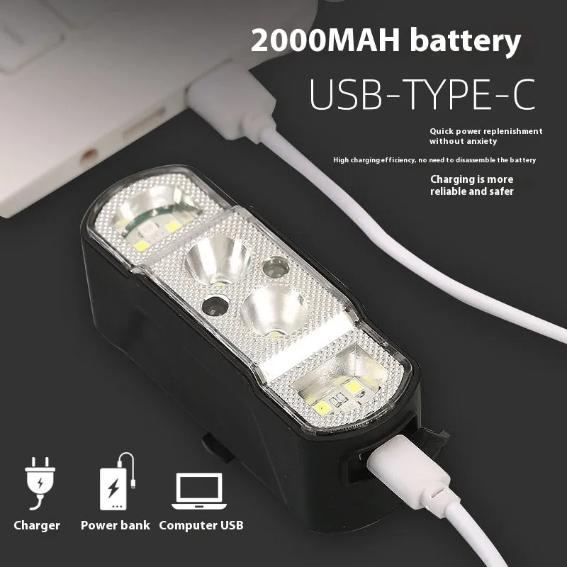 Black bicycle headlight with 350 lumen LED and removable 18650 battery mounted on handlebars