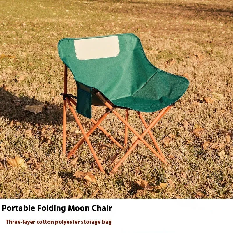 Beige portable folding chair with steel frame and Oxford cloth seat, unfolded for outdoor use.
