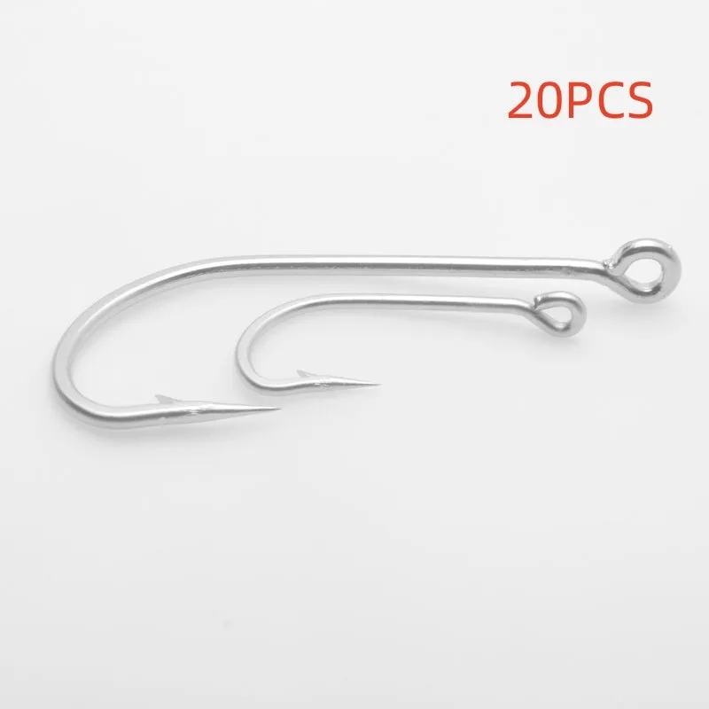 Assortment of alloy sea fishing hooks on a blue background for ocean boat fishing.