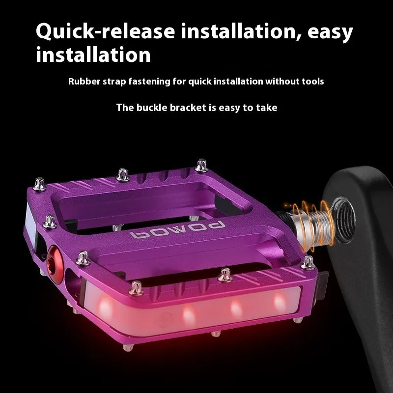 Aluminium alloy bicycle pedals with built-in 710LED lights in black, gold, purple, red, and titanium colour options.