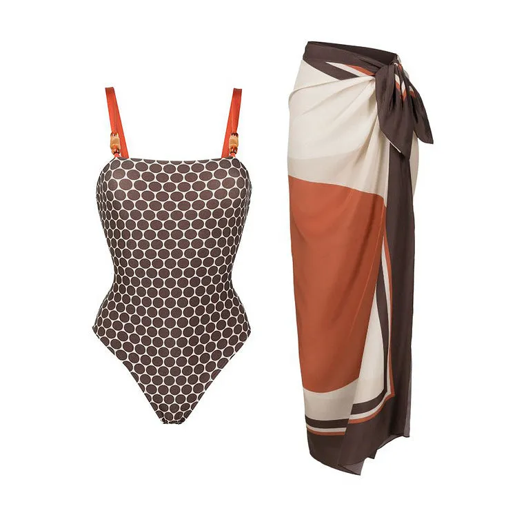Women's printed dot pattern one-piece swimsuit with matching wrap skirt