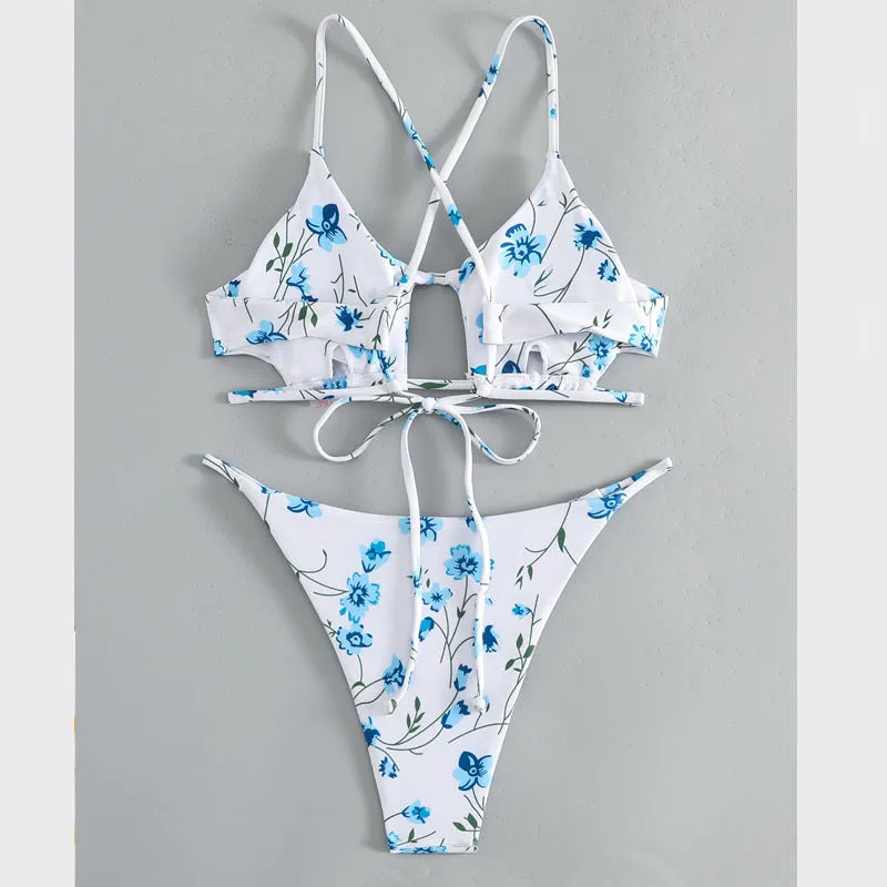 Women's floral swimsuit set with tie-neck triangle top and matching shorts