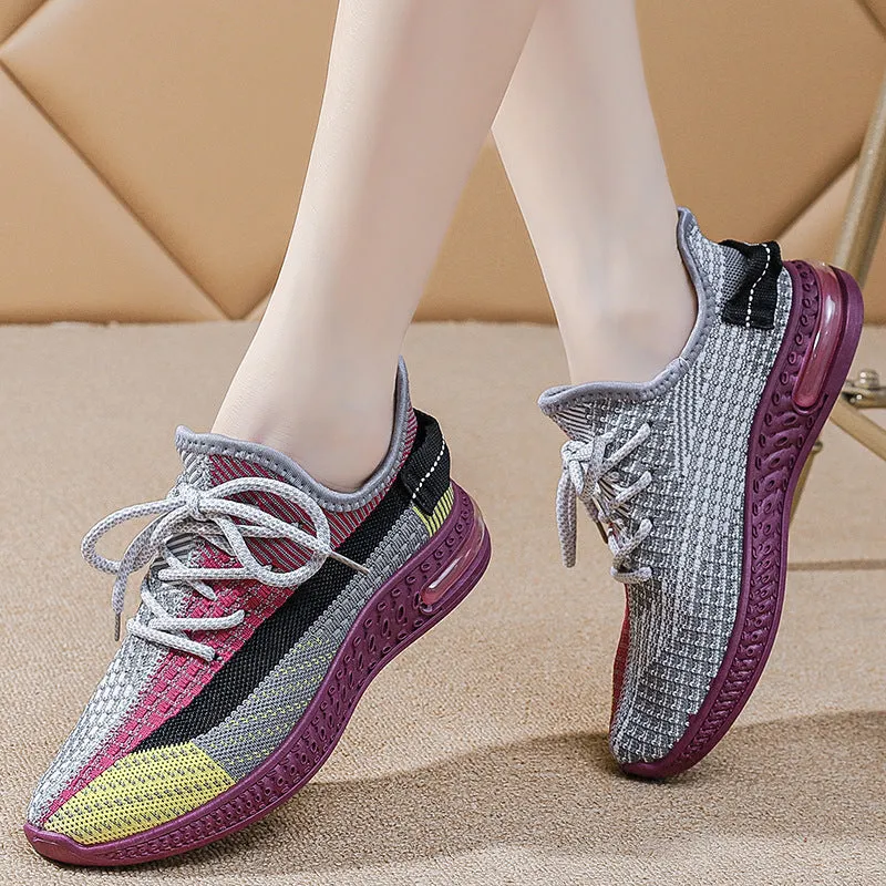 Women's purple casual lace-up running shoes with a round toe and flat plastic sole.