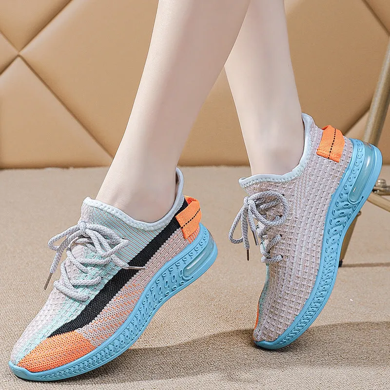 Women's purple casual lace-up running shoes with a round toe and flat plastic sole.