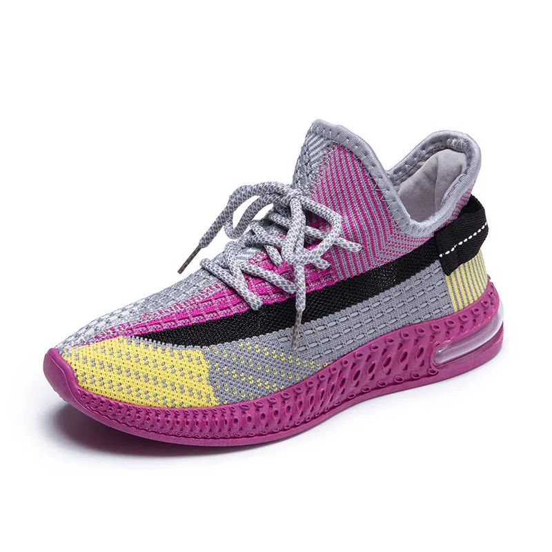 Women's purple casual lace-up running shoes with a round toe and flat plastic sole.