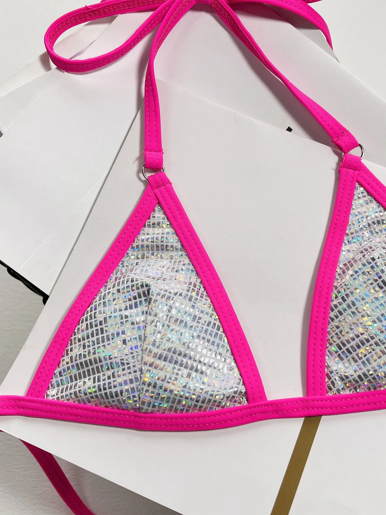 Silver women's split triangle bag bikini top on a white background.