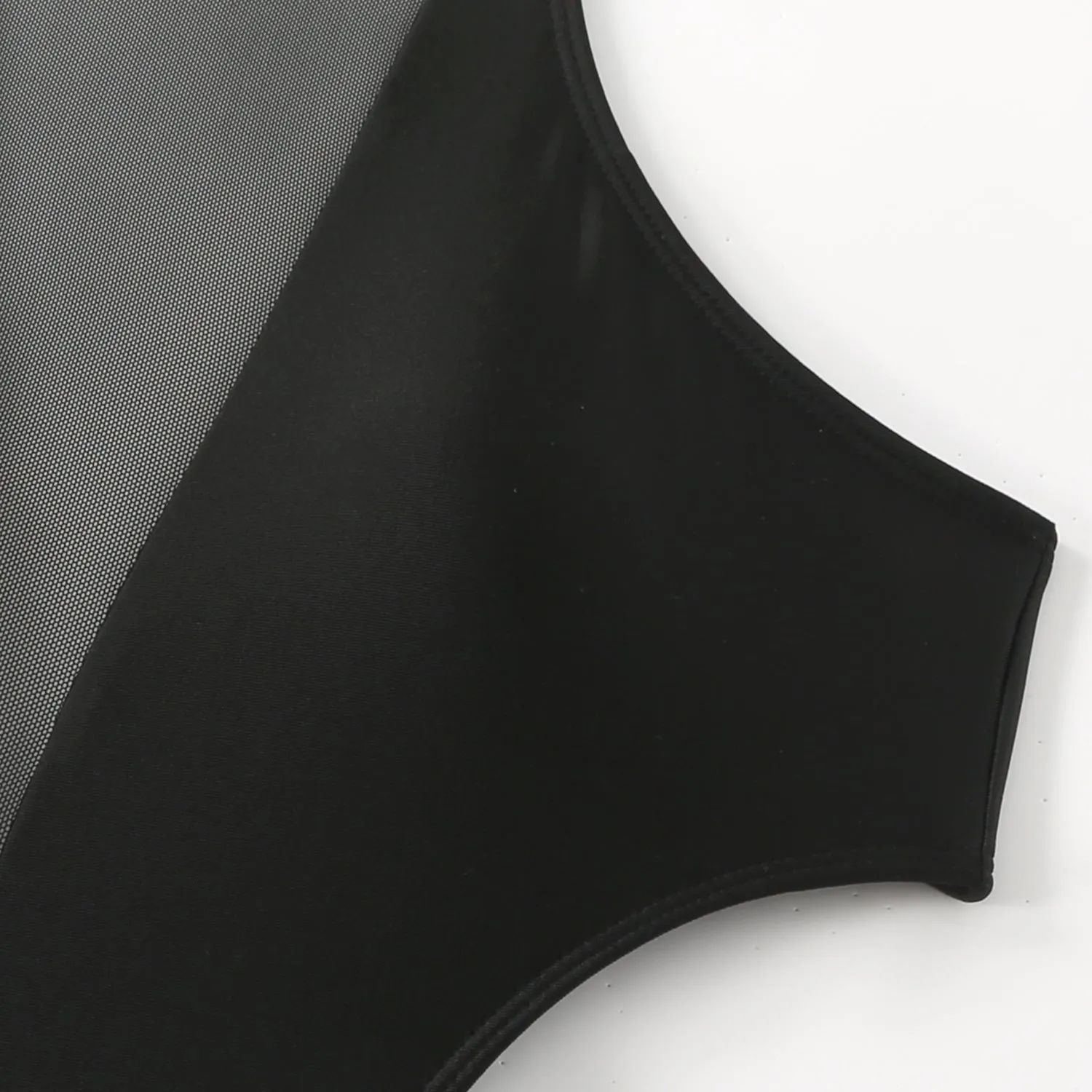 Black one-piece swimsuit with nude back design and hollow-out detailing on female model