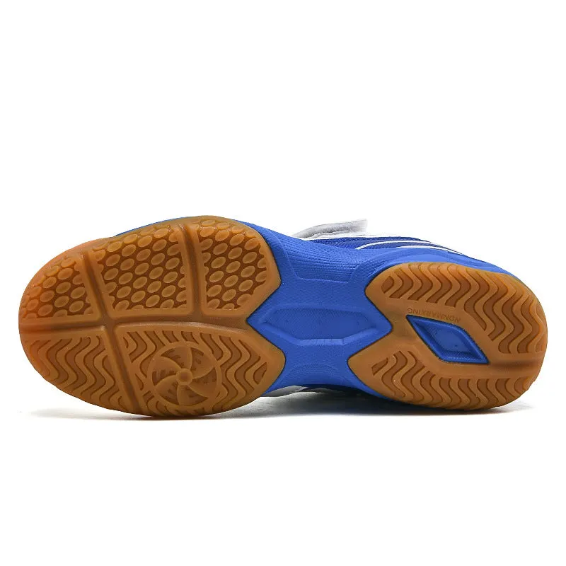 White and blue lightweight badminton shoes with a low-top PVC upper and ribbed sole.