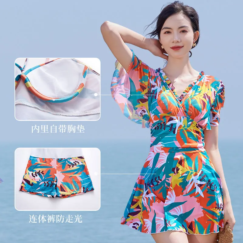 Colourful printed one-piece swimsuit for women available in sizes M to 3XL with belly coverage