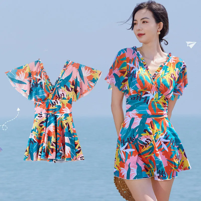 Colourful printed one-piece swimsuit for women available in sizes M to 3XL with belly coverage