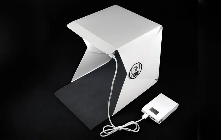 Portable folding LED studio mini light box with 22.6x23x24cm dimensions and 20cm light bar