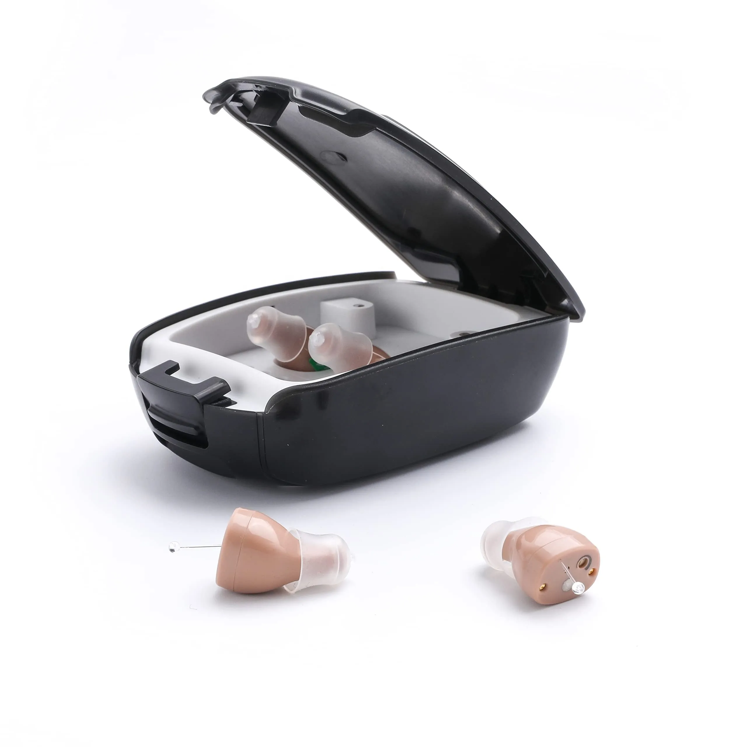 Rechargeable hearing amplifier in beige skin-coloured design with portable charging case and accessories