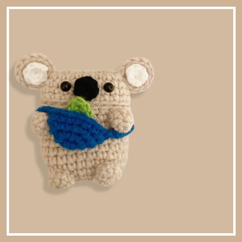 Hand-knitted koala bear backpack design protective cover for Apple AirPods charging case.