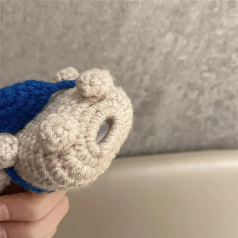 Hand-knitted koala bear backpack design protective cover for Apple AirPods charging case.