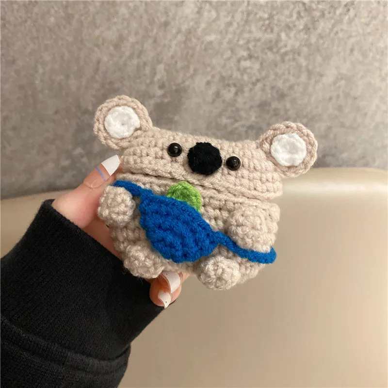 Hand-knitted koala bear backpack design protective cover for Apple AirPods charging case.
